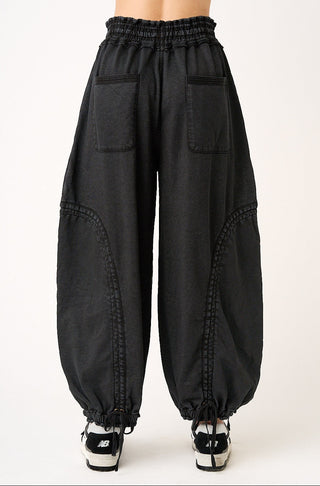 Black wide-leg pants on a white background