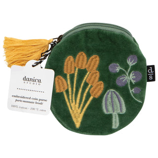 Green embroidered coin purse with floral designs and a yellow tassel on a white background