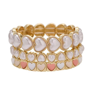 A bright colourful bracelet stack.