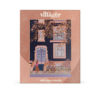 Villager puzzle box with illustration of a street scene and 'villager' branding.