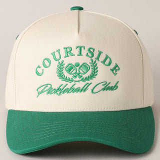 Green and beige cap with 'Courtside Pickleball Club' text on a light gray background