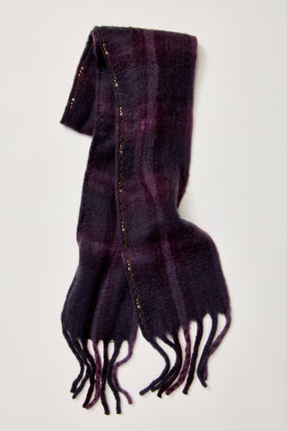 A dark purple and black plaid scarf with gold metallic trim and fringe tassels, displayed against a light gray background.
