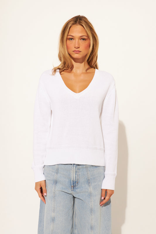 women wearing a white sweater 