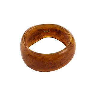 Wooden bangle on a white background