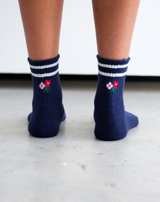 Women wearing navy floral socks