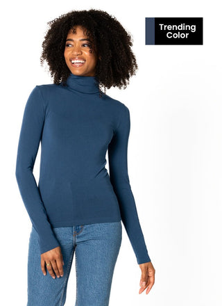 women wearing a blue bamboo turtleneck