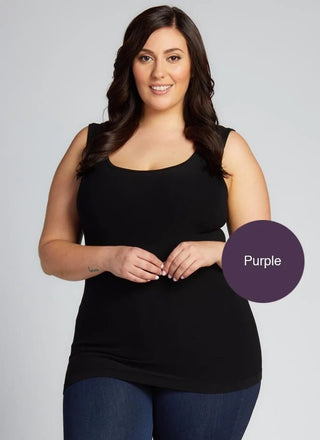 A woman wearing a Bamboo Curvy Classic Tank Top with thick straps and a scoop neckline.