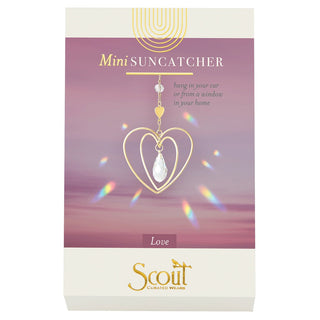 a box of a sun catcher in the shape of a heart