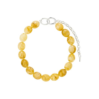 A beaded bracelet made of round, polished yellow amber beads with silver-toned metal hardware, including a lobster clasp and an adjustable chain extender, shown on a plain white background.