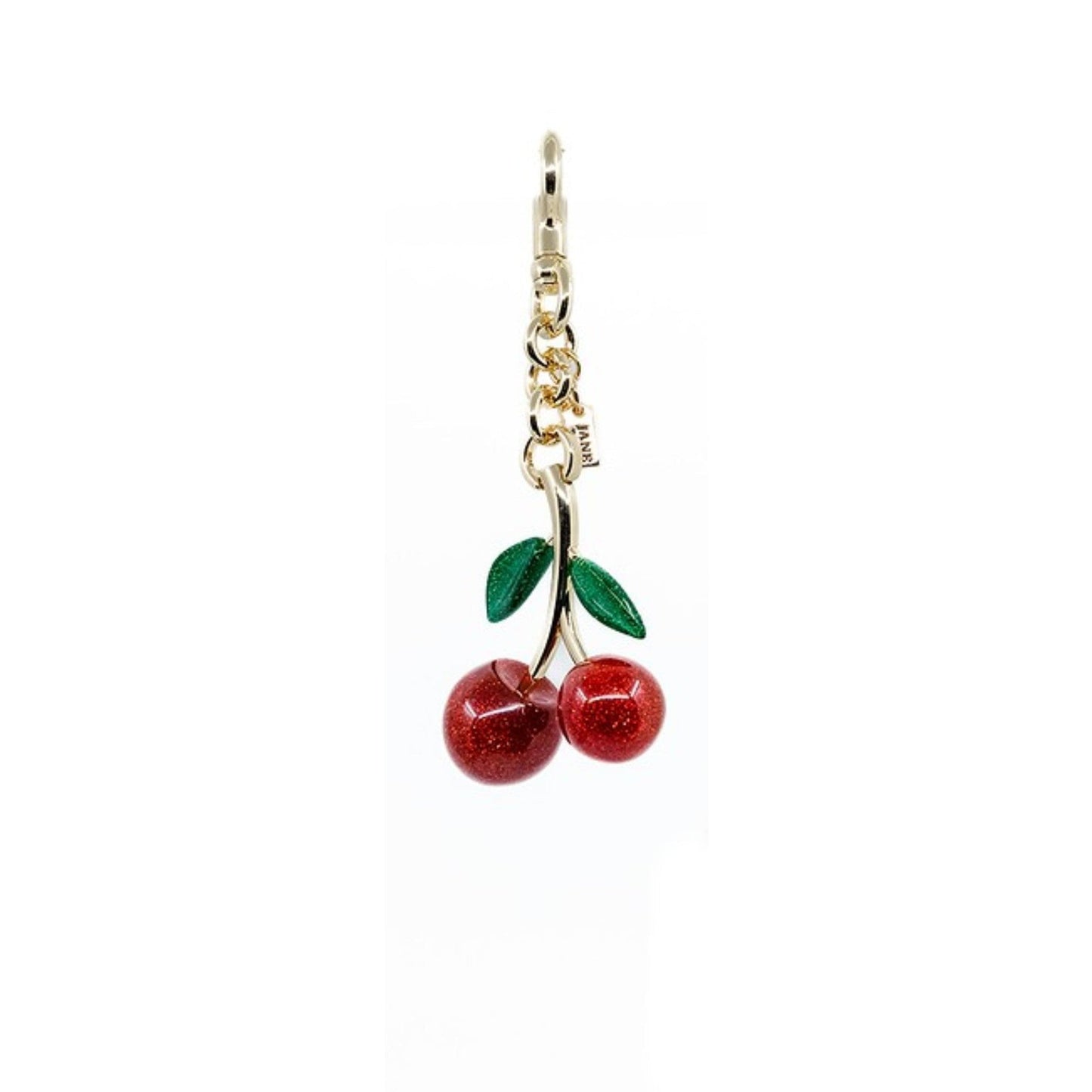 Cherry-shaped keychain with gold chain on a white background