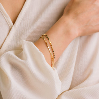 a double layer gold bracelet