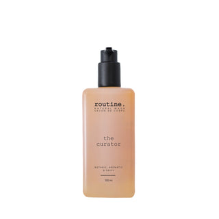 Bottle of 'routine.' body wash on a white background
