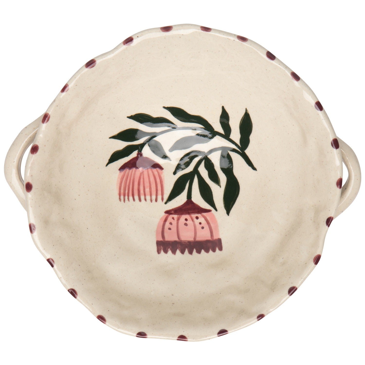 Ceramic pie dish with floral design on a white background