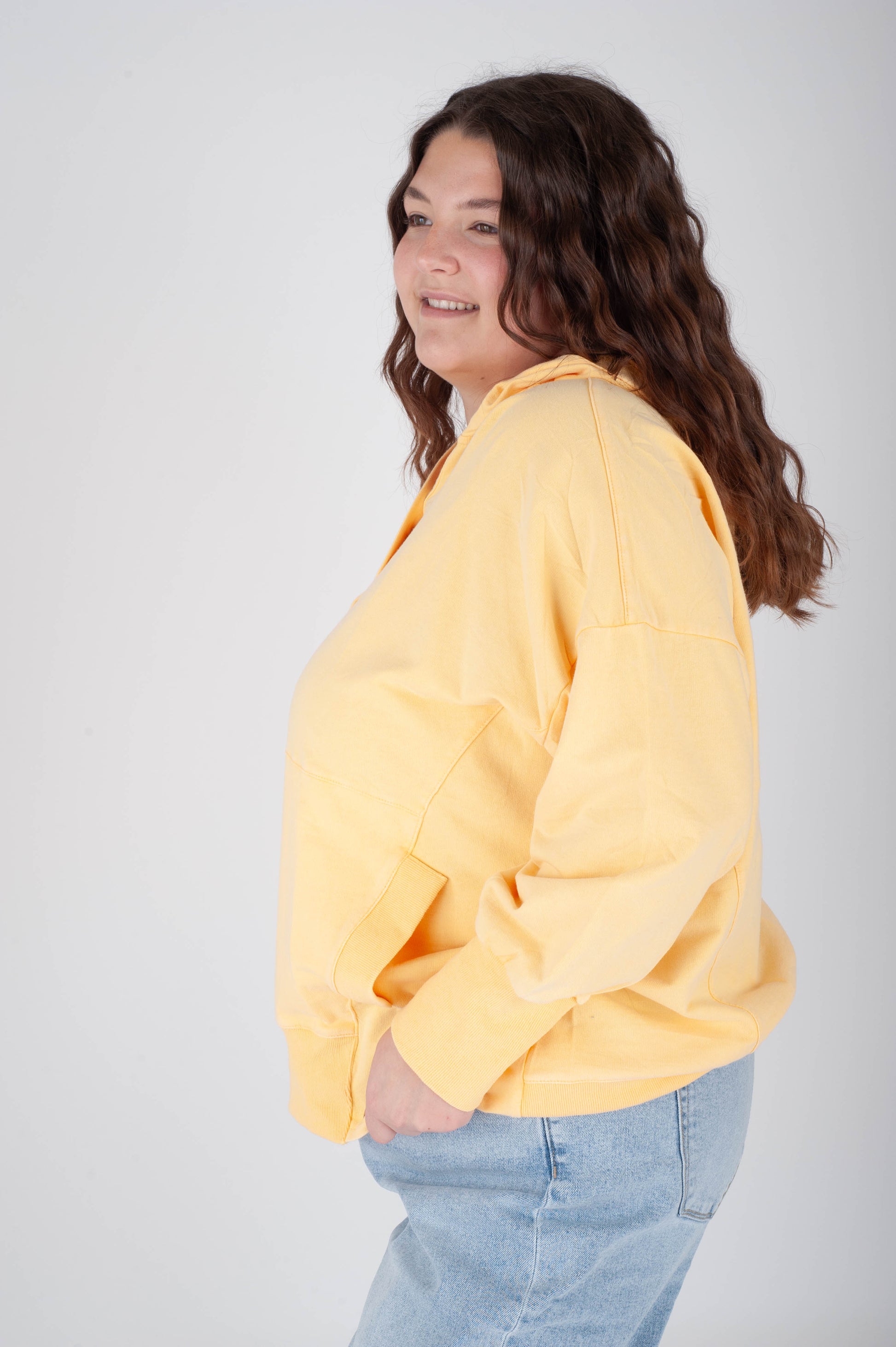 women wearing a orange hoodie