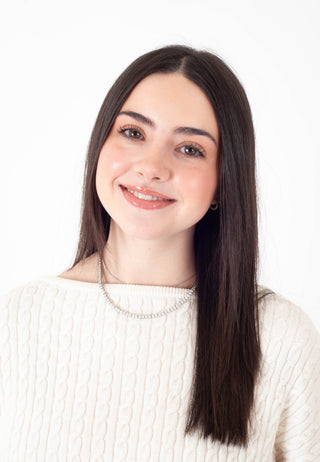 women headshot against a white background.