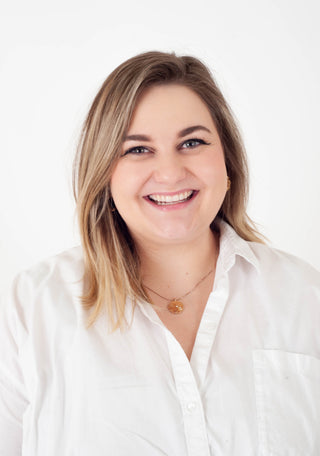 women's headshot against a white background