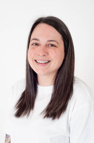 Women headshot against a white backdrop.
