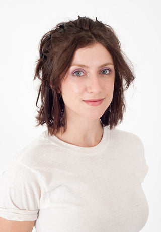 women headshot against a white background.