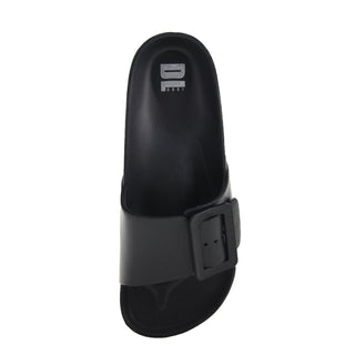 Black sandal with a buckle on a white background