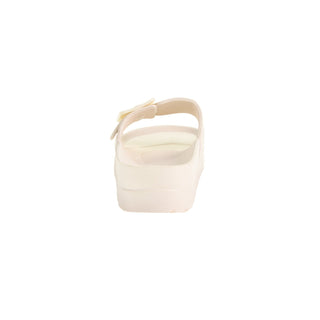 White sandal with a strap on a white background