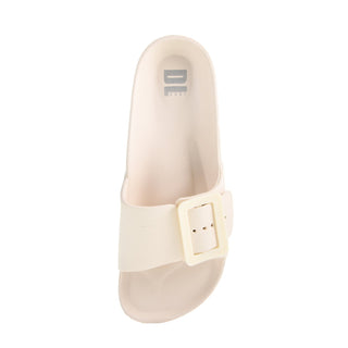 Beige sandal with a buckle on a white background