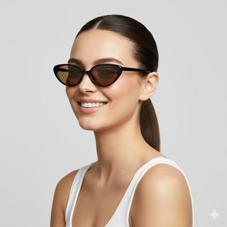Woman wearing cat-eye sunglasses with a plain background
