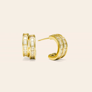 a pair of diamond double hood earrings. 