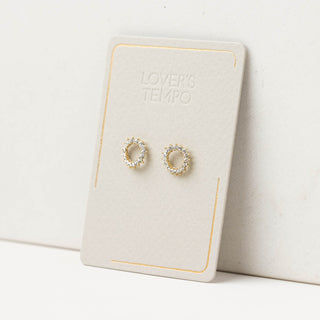 A pair of gold and silver halo stud earrings with cubic zirconia, displayed on a card with the text 'LOVER'S TEMPO'.