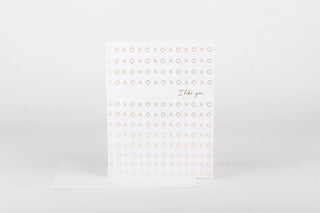 Notebook with 'I love you' text on a white background