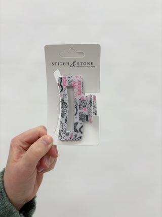 a red heart hair clip