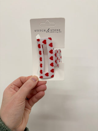 a red heart hair clip