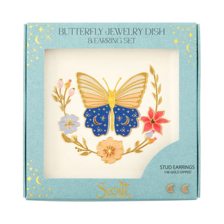 A jewelry dish with a butterfly design and a pair of gold dipped earrings presented in a box with celestial and botanical motifs.
