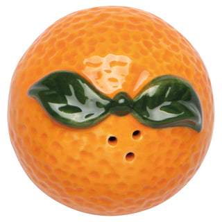 Ceramic orange with green leaf on a white background