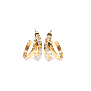 Gold hoop earrings with embedded stones on a white background
