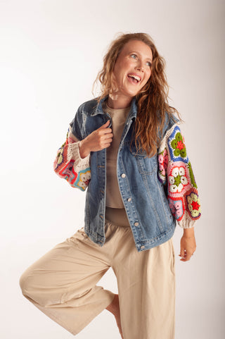 Women wearing a matching lounge set and a crochet  sleeve denim jacket.