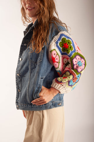 Women wearing a matching lounge set and a crochet  sleeve denim jacket.
