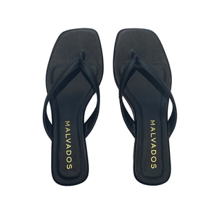 Black flip-flops with 'MALVADOS' branding on a white background