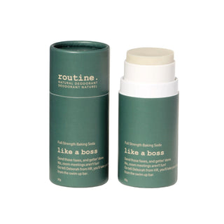 Green cylindrical container with 'routine.' branding on a white background with the lid off