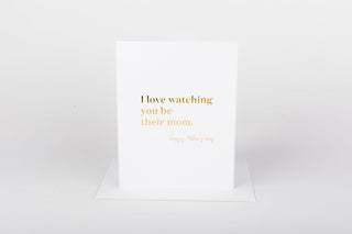 Greeting card with gold text on a white background