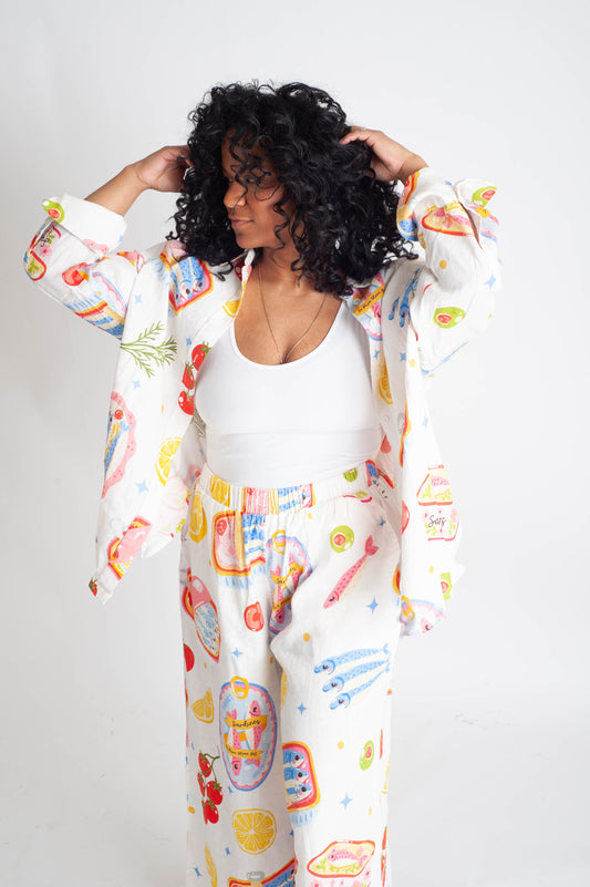 Person wearing a colorful outfit with a white background