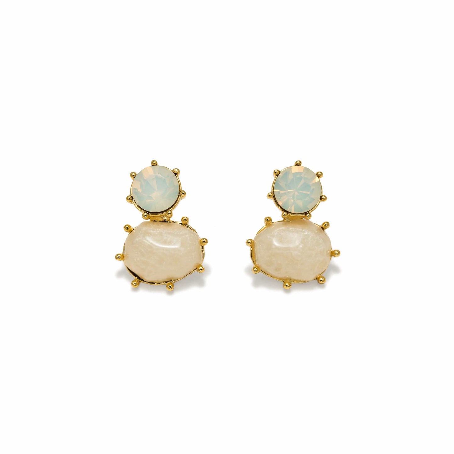 Pair of gold earrings with beige stones on a white background