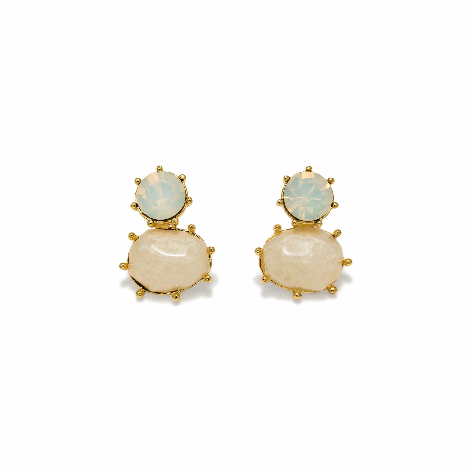 Pair of gold earrings with beige stones on a white background