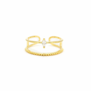 a gold ring with a cz diamond on a white background