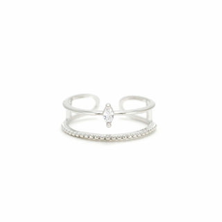 a silver ring with a cz diamond on a white background