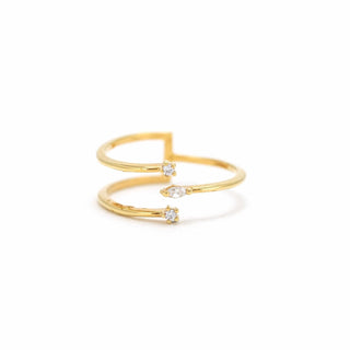 a three tiered gold ring with cz diamond