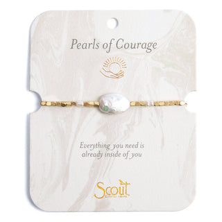 Bracelet with pearl and gold accents on a 'Pearls of Courage' Scout jewelry card.