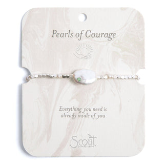 Bracelet with pearl and silver accents on a 'Pearls of Courage' Scout jewelry card.