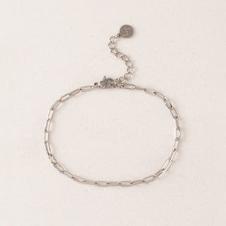 Silver bracelet on a light background