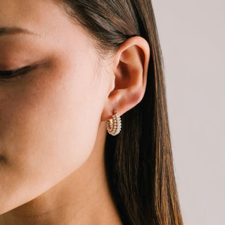 person earring hoop earrings