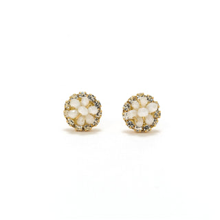 a close up on floral gem earrings